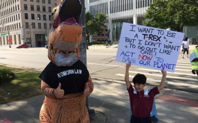Climate Change Activists in Detroit March Down Woodward