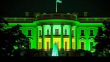 The White House lit up in green Lights